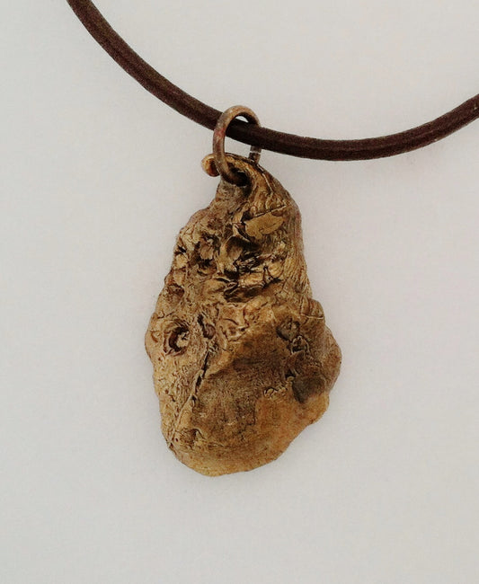 Bronze oyster shell necklace on leather cord