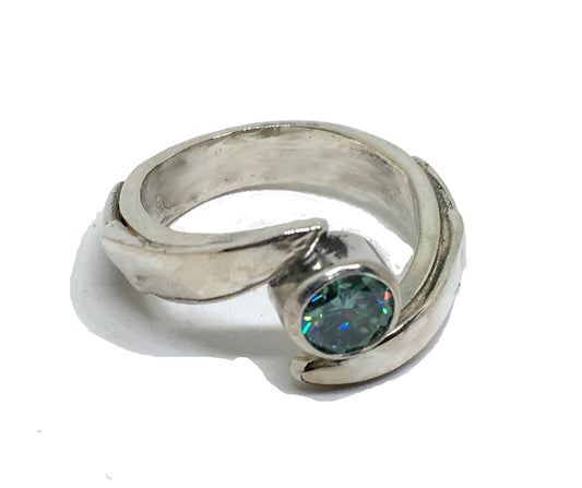 sterling silver chef knife engagement ring with blue moissanite