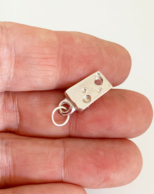 cheese charm in hand