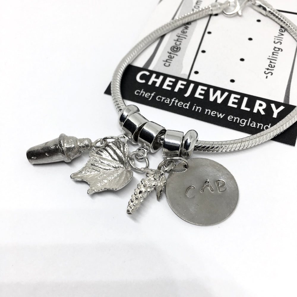 Sterling bartenders snake chain charm bracelet